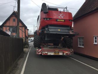 Large Vehicle driving into the village